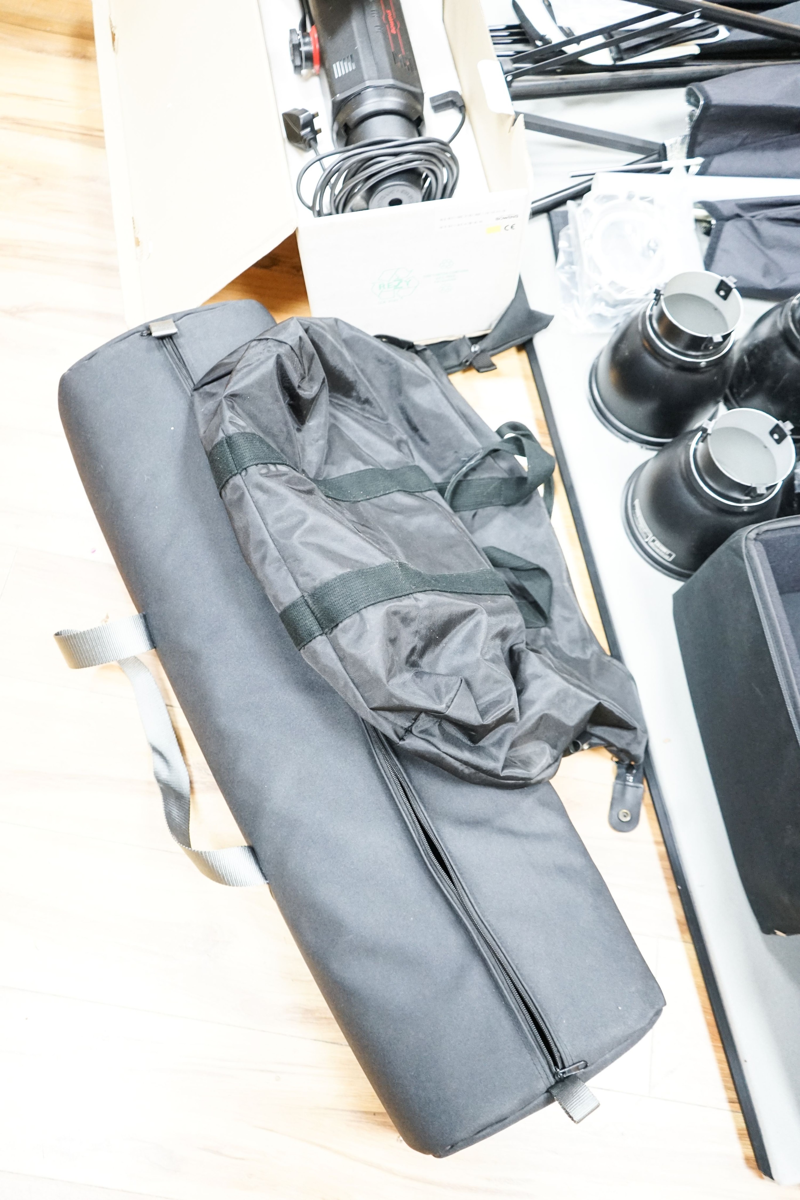 Professional photography equipment including a Pentax P30T SLR camera with Tamron 90mm f/2.5 lens, a pair of Bowens Esprit 1000 lights and a pair of Esprit 500 lights, a pair of Esprit 2 500 lights, various soft boxes, v